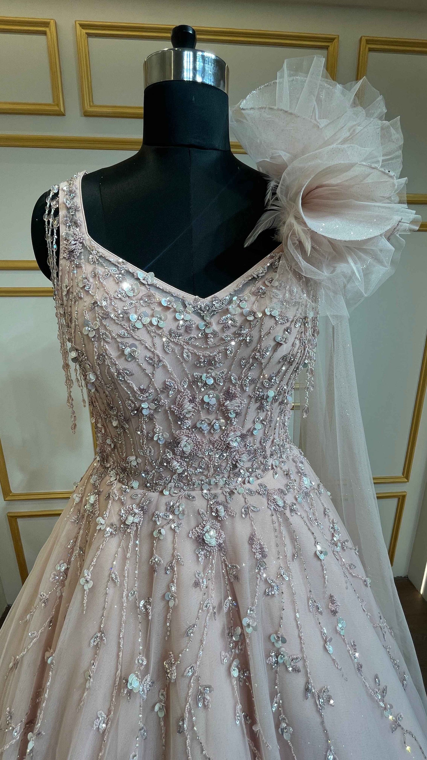 Pearl & crystal work on Light peach ball gown in net