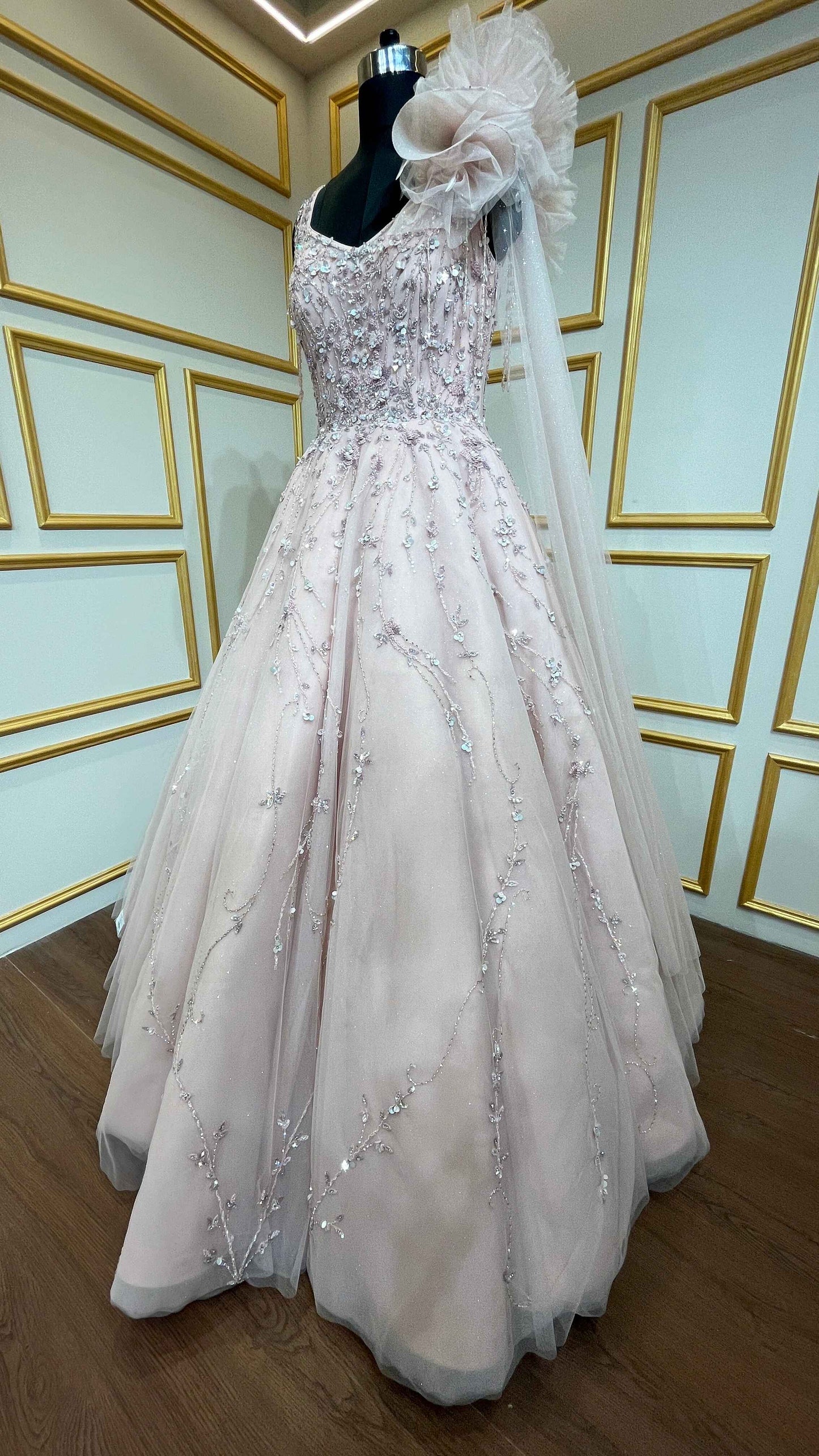 Pearl & crystal work on Light peach ball gown in net
