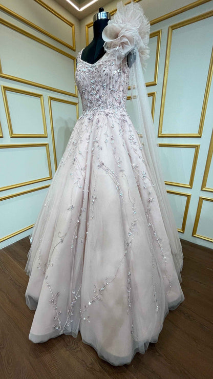 Pearl & crystal work on Light peach ball gown in net