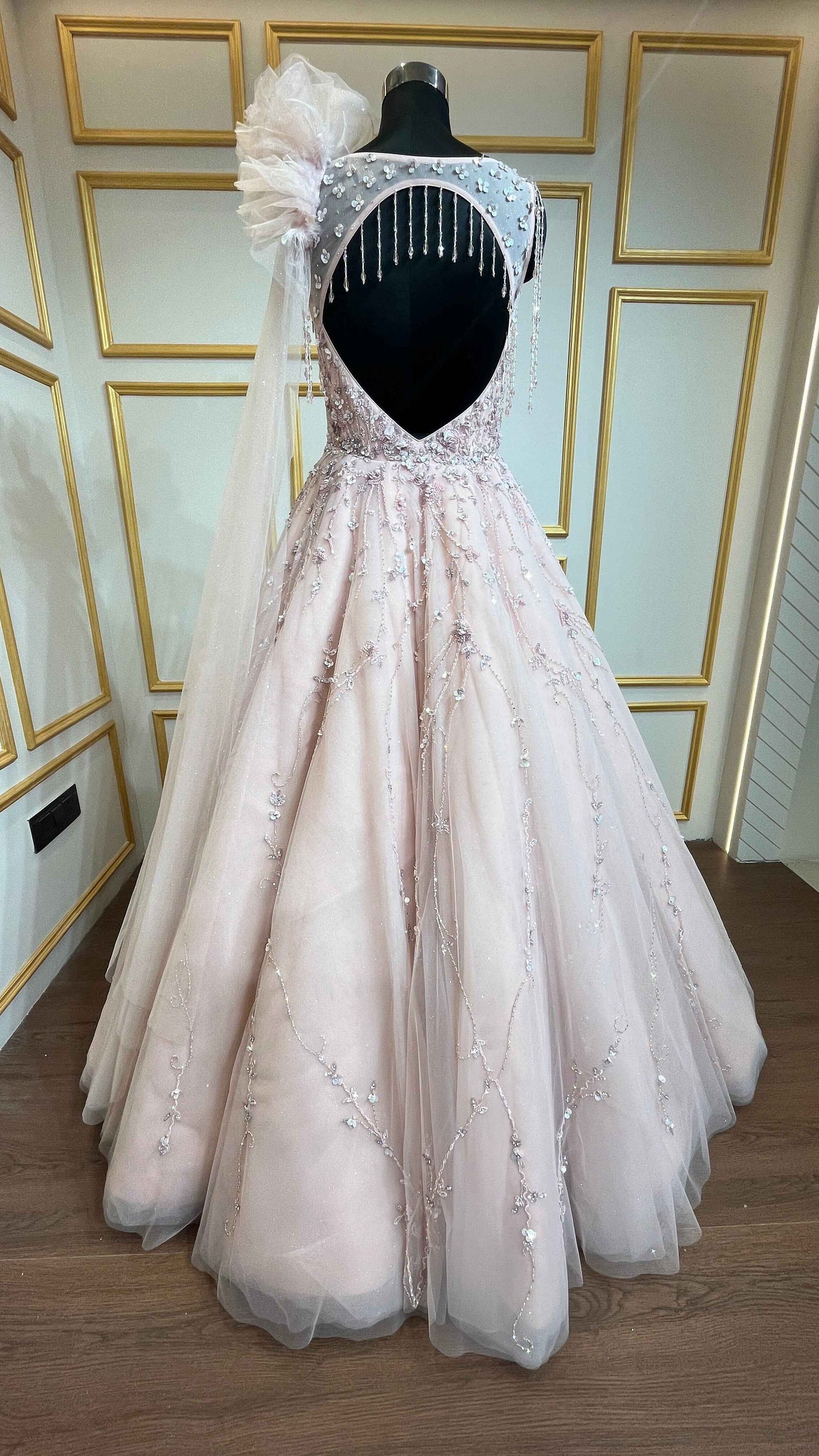 Pearl & crystal work on Light peach ball gown in net