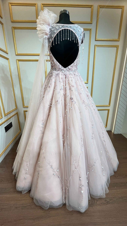Pearl & crystal work on Light peach ball gown in net
