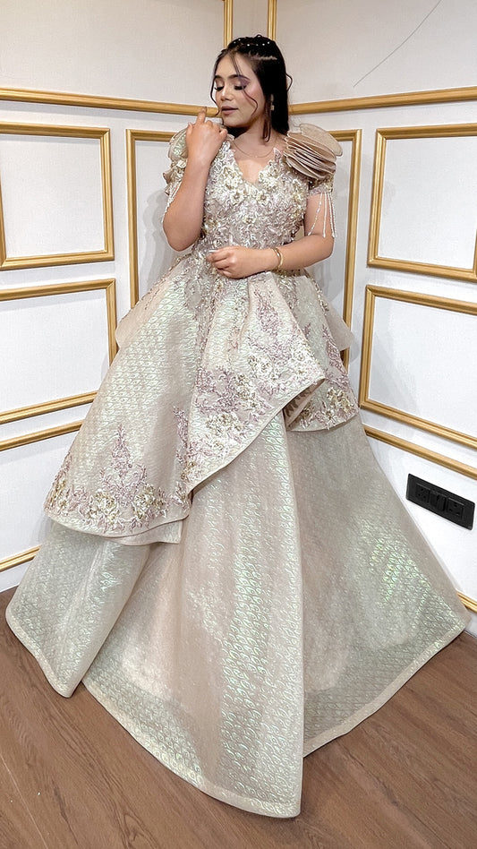 Russian self tissue engagement gown with resham & zardozi hand touch in golden