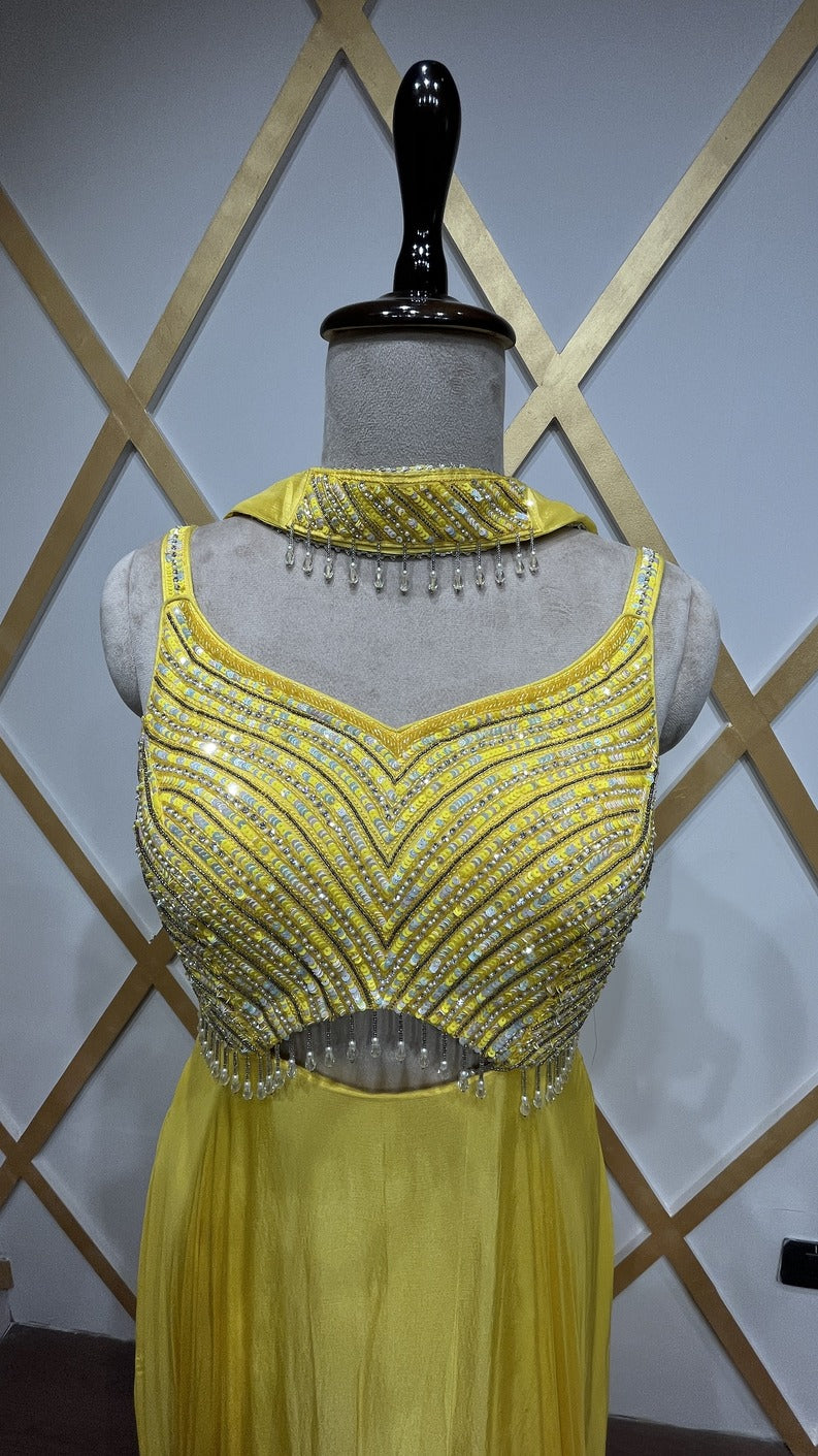 Chinon bright yellow dress with resham & pearl along with peephole detailing
