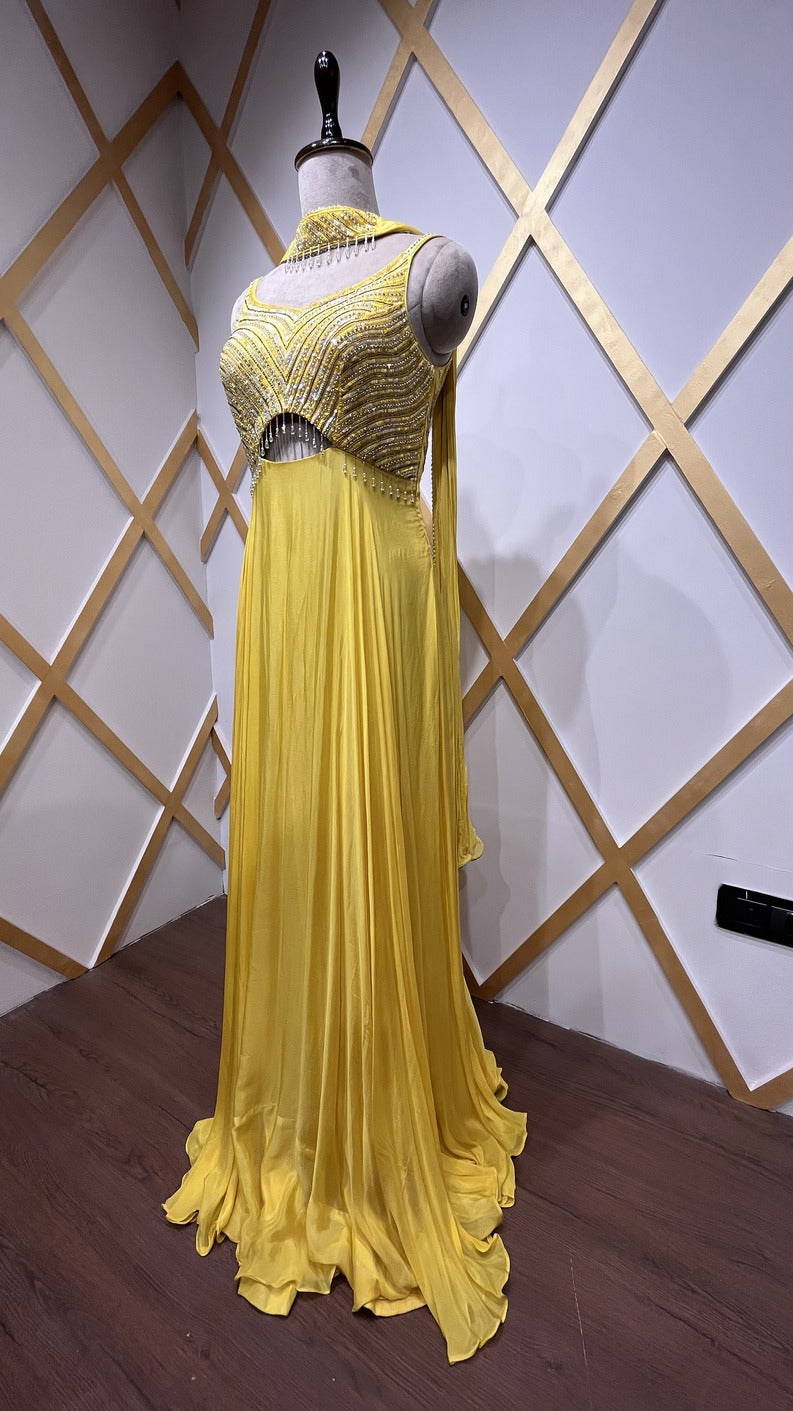 Chinon bright yellow dress with resham & pearl along with peephole detailing