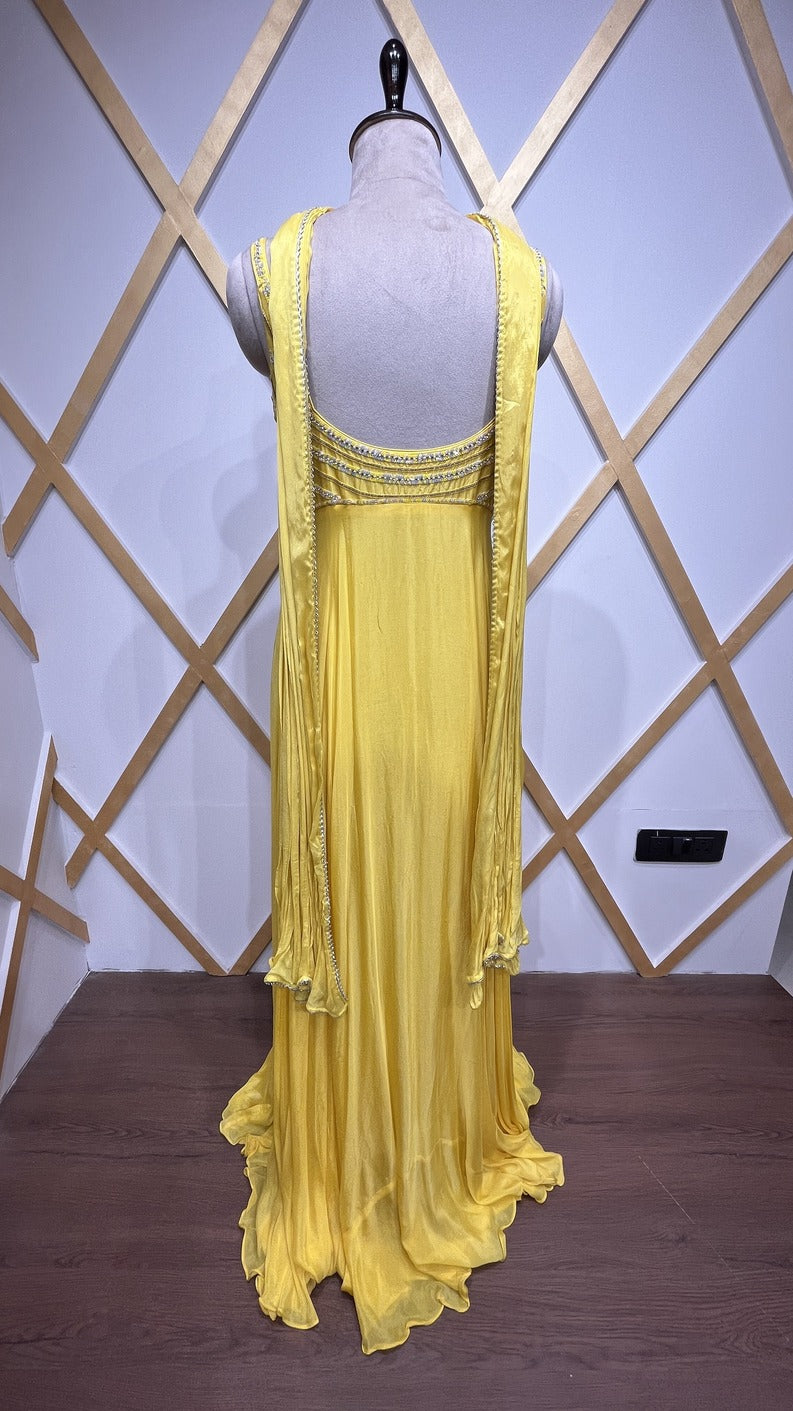 Chinon bright yellow dress with resham & pearl along with peephole detailing