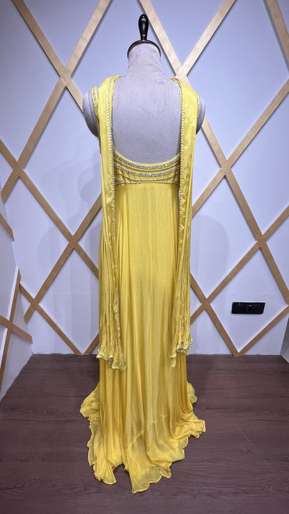 Chinon bright yellow dress with resham & pearl along with peephole detailing