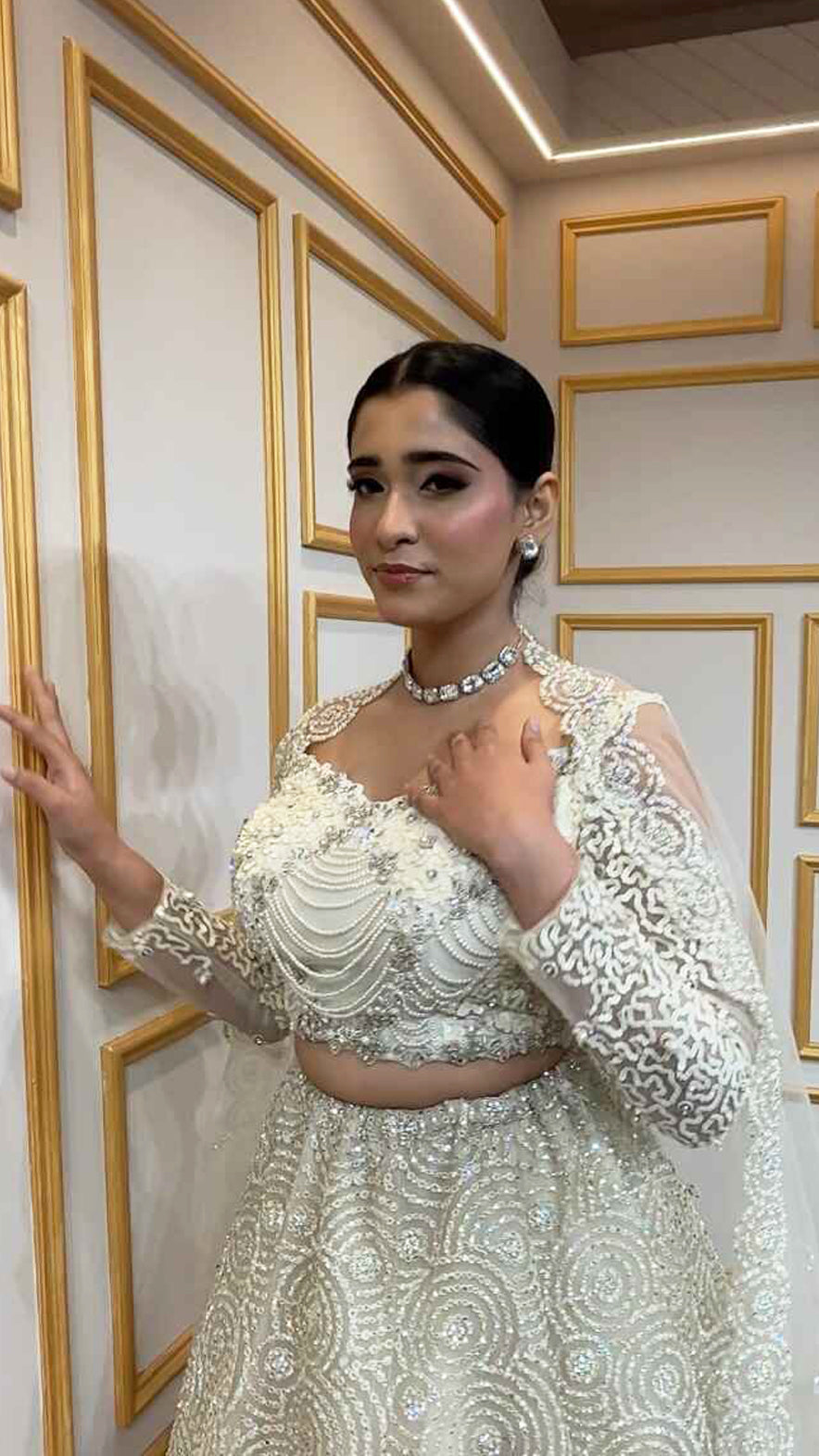 Ivory net lehenga with pearl & crystal