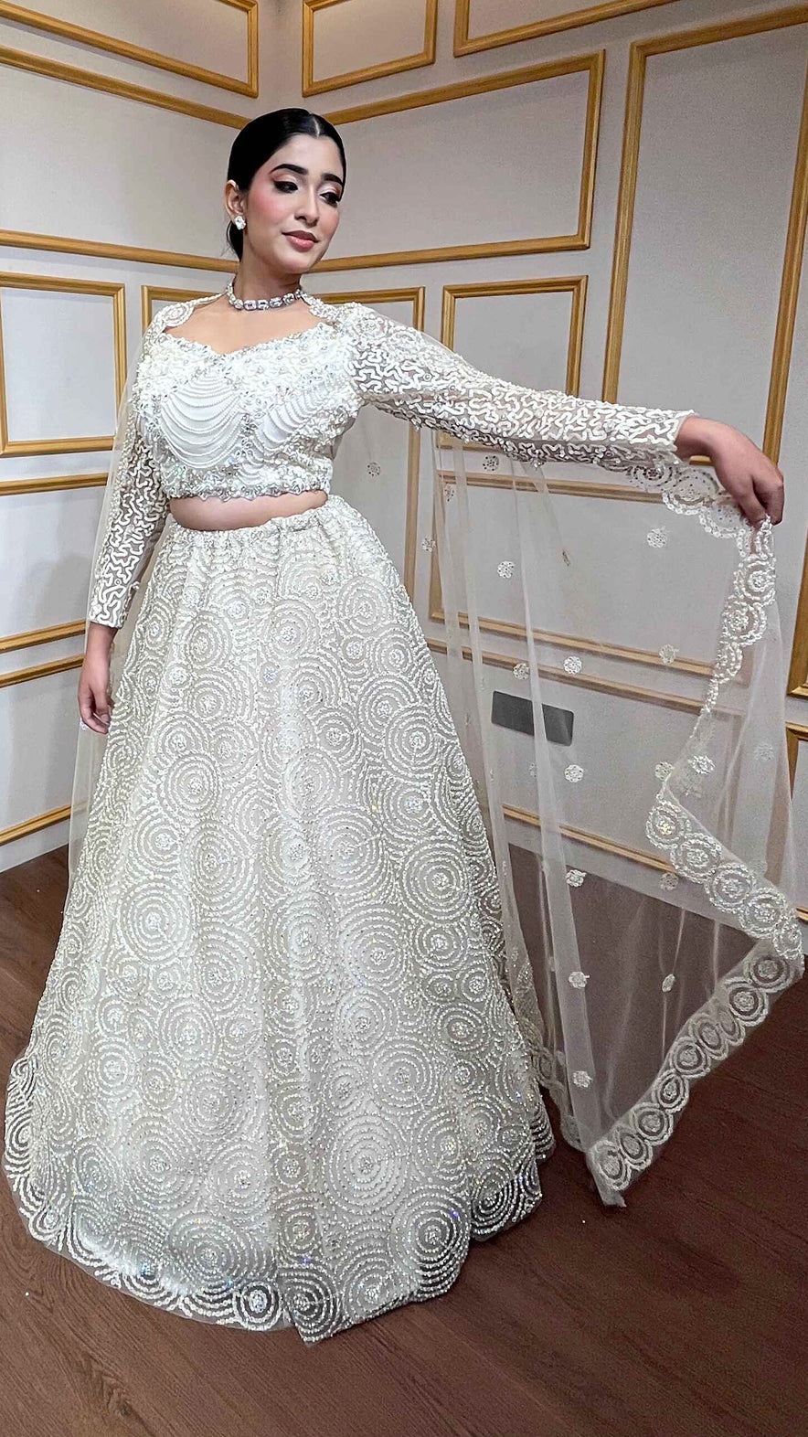 Ivory net lehenga with pearl & crystal