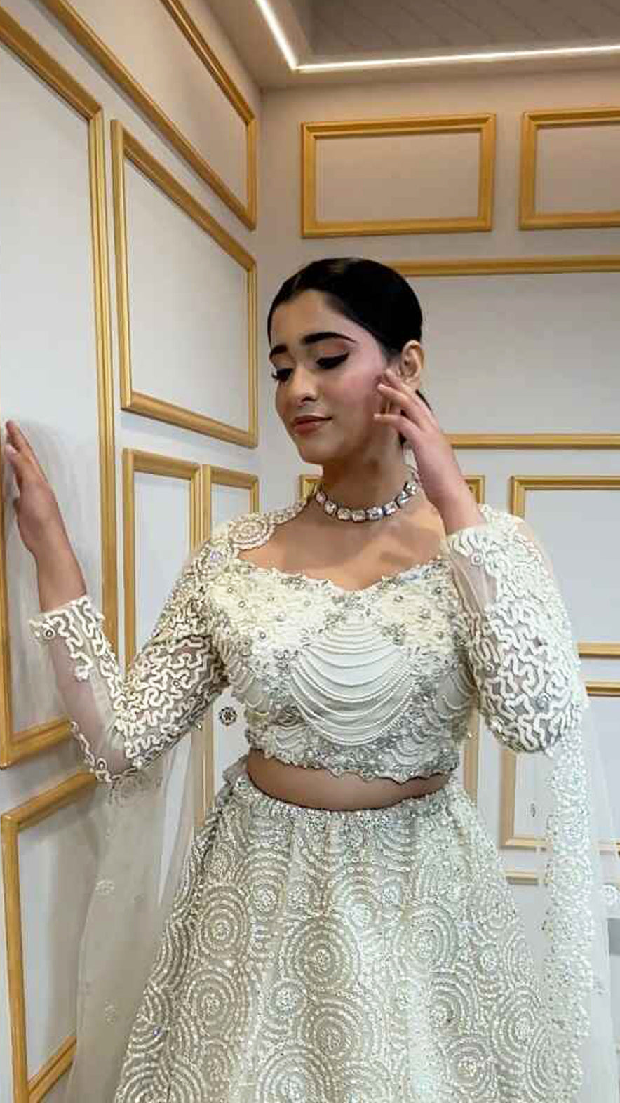 Ivory net lehenga with pearl & crystal