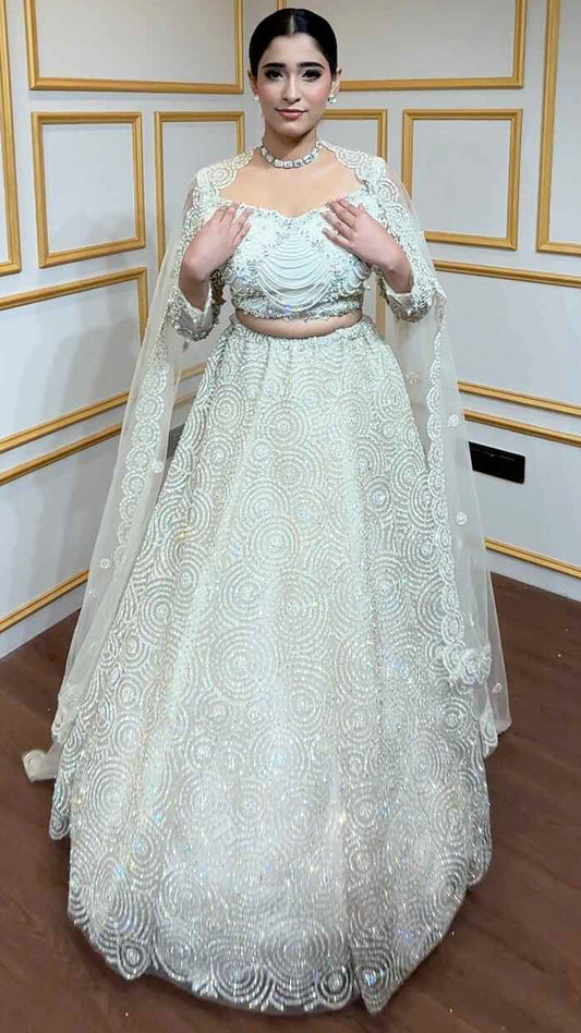 Ivory net lehenga with pearl & crystal