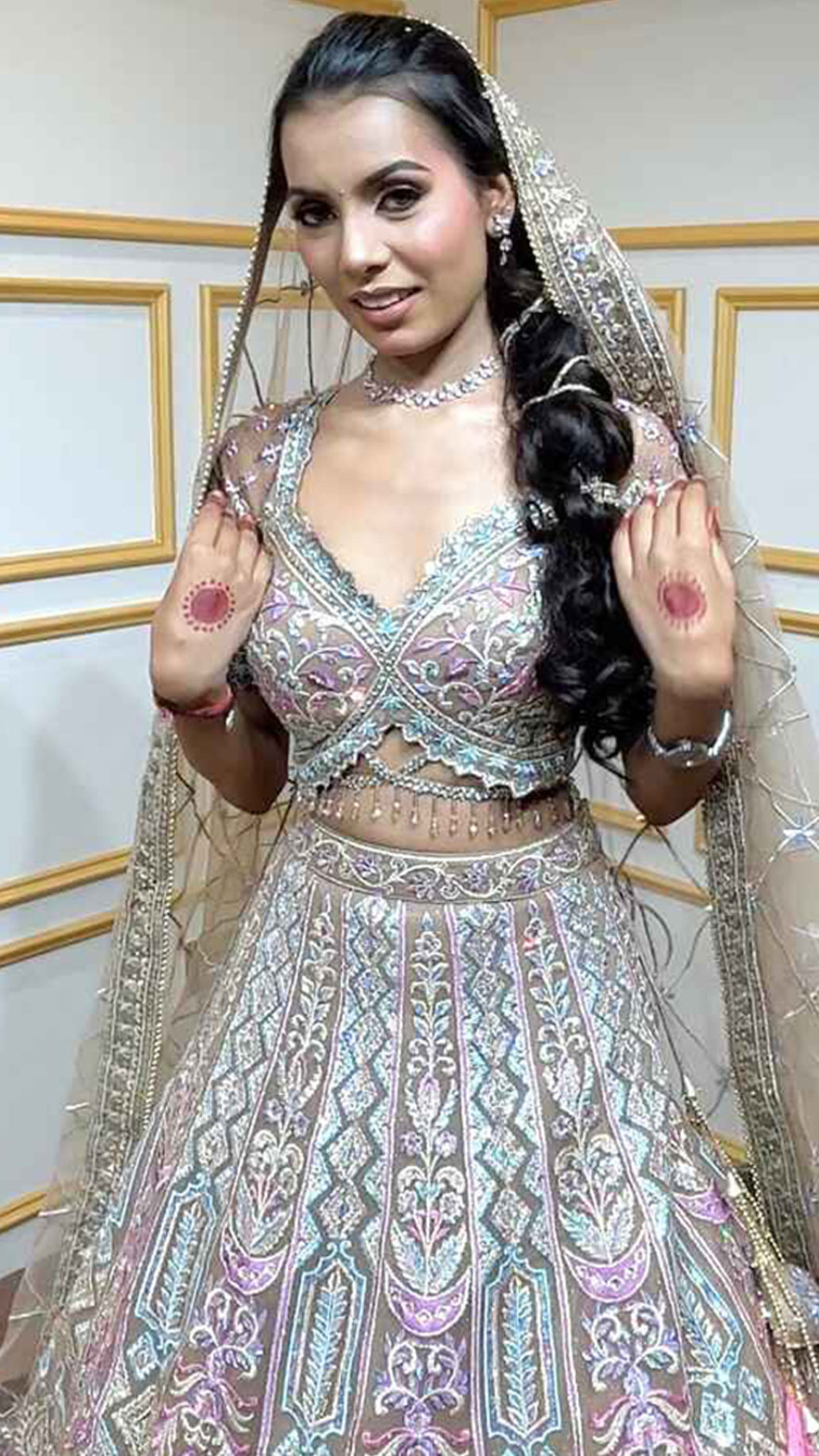 Multicolor thread & zari work on nude brown net lehenga with heavy dupatta
