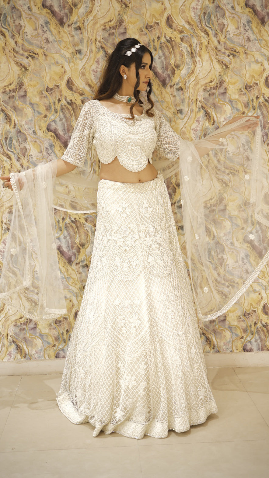 Net bridal lehenga choli in ivory with pearl & sequins