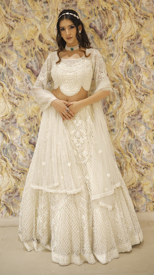 Net bridal lehenga choli in ivory with pearl & sequins