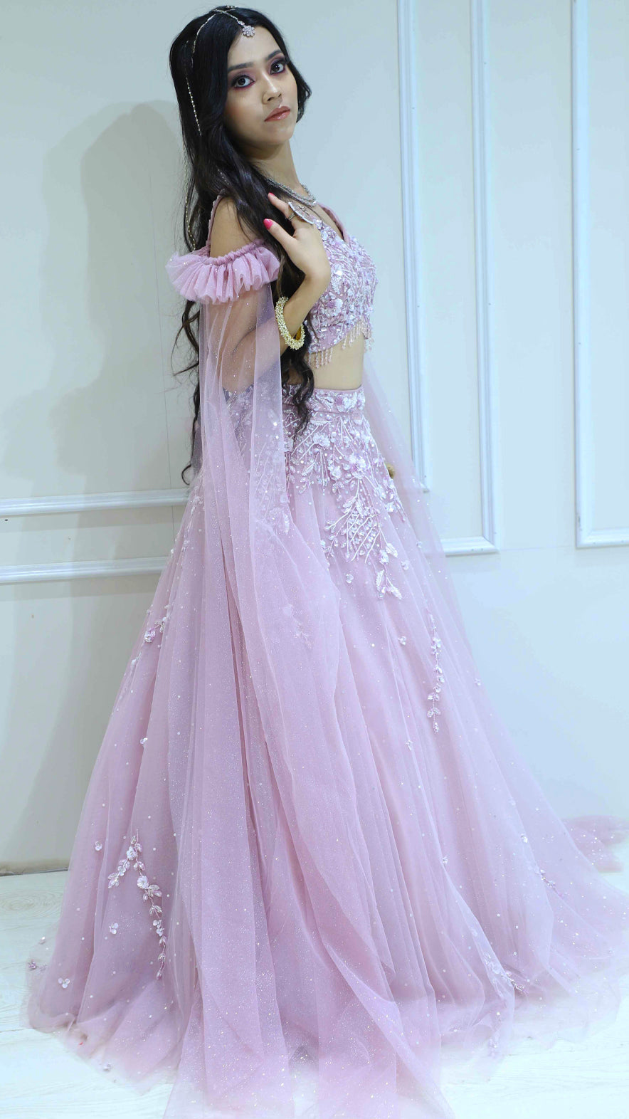 Net lehenga in blush pink with sequins & stone
