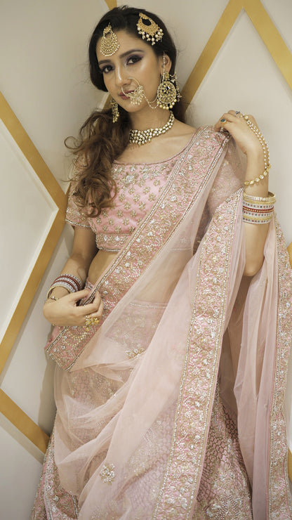 Dabka & Zardozi work on raw silk pink color bridal lehenga
