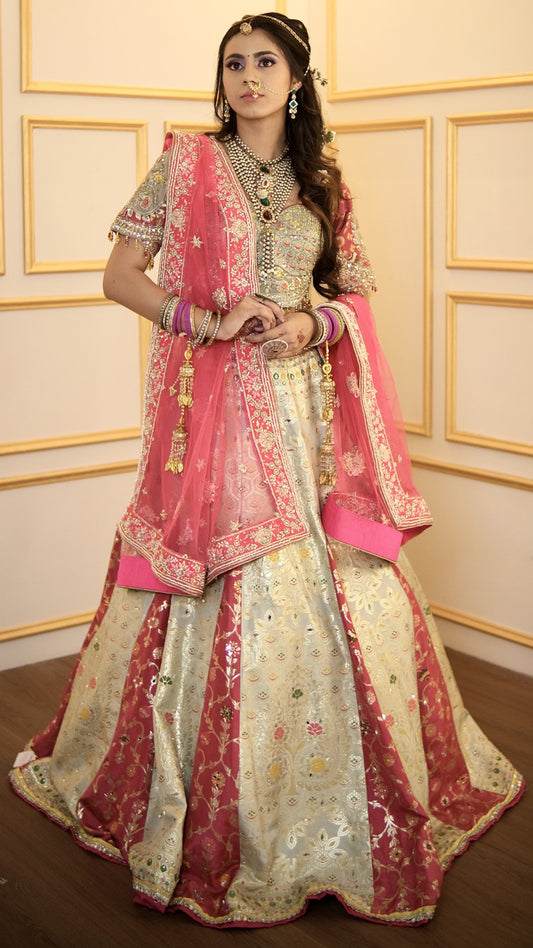 Pista green & magenta lehenga choli with cut dana &  resham work in banarasi fabric