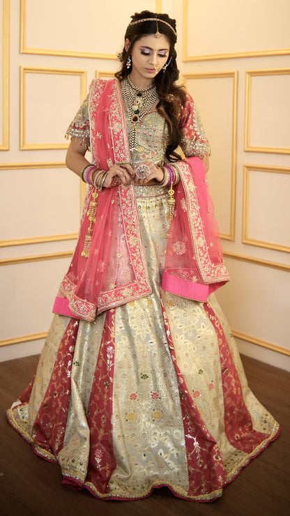 Pista green & magenta lehenga choli with cut dana &  resham work in banarasi fabric