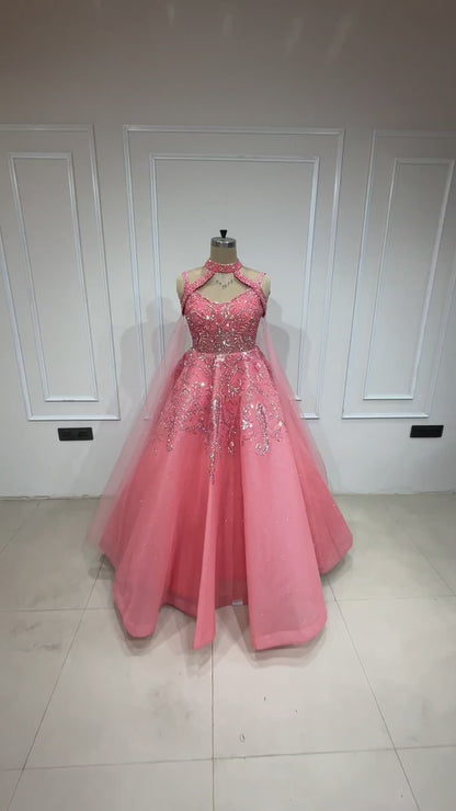 Carrot peach engagement gown with crystal & cut dana work on mesh