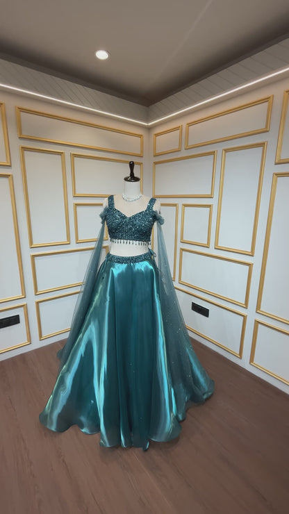 Bottle green organza lehenga choli with crystal & sequins
