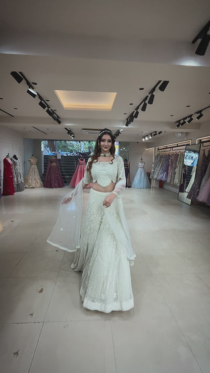 Net bridal lehenga choli in ivory with pearl & sequins