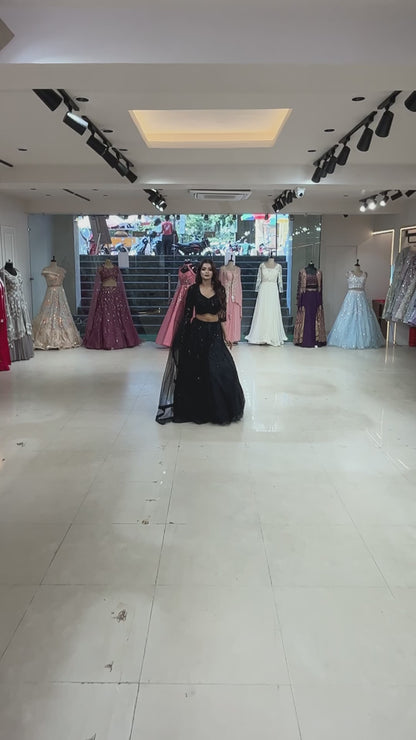 Black net lehenga with cut dana & sequins