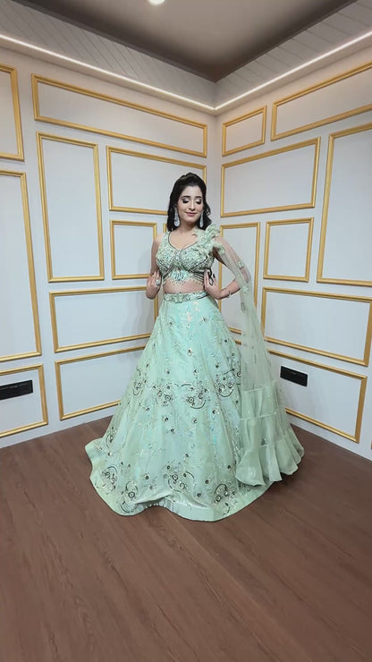Mint green engagement lehenga with sequins & pearl work on organza