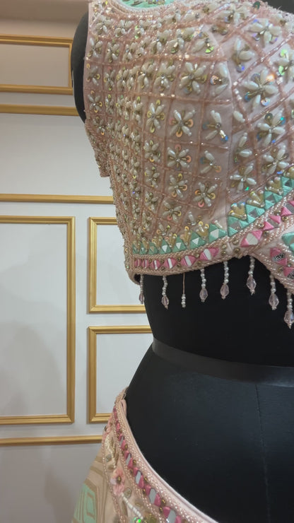 Multicolor lehenga with pearl & cut dana in brocade