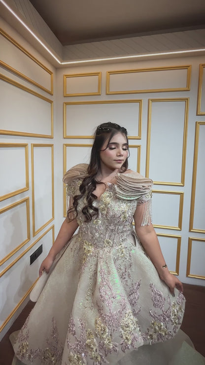 Russian self tissue engagement gown with resham & zardozi hand touch in golden