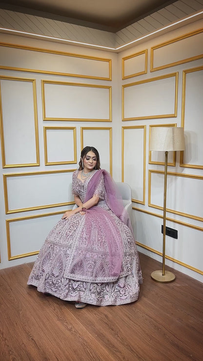 Dusty mauve lehenga with crystal & zari work on net with heavy dupatta