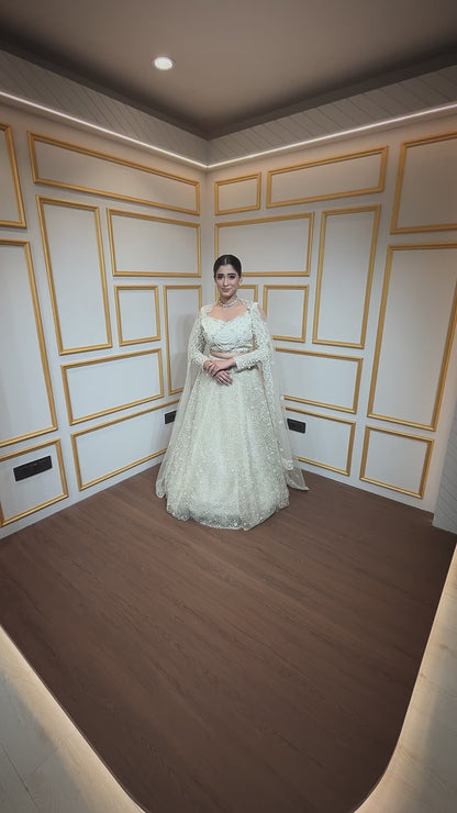 Ivory net lehenga with pearl & crystal