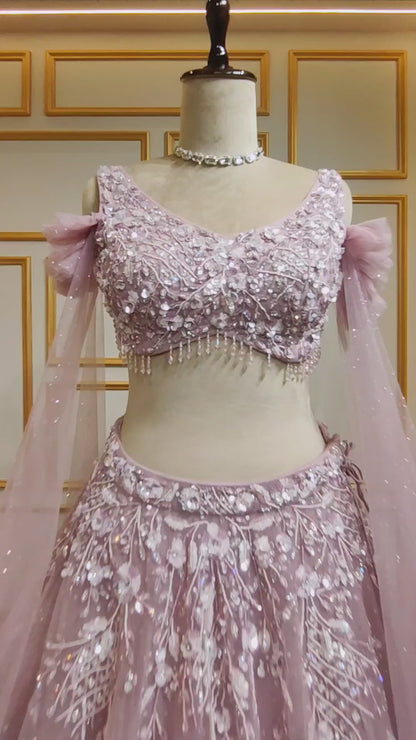 Net lehenga in blush pink with sequins & stone