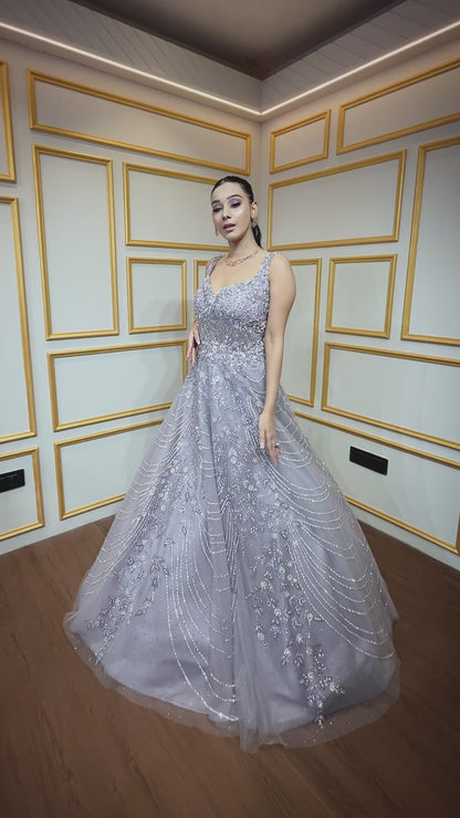 Zarkan & pearl work on lilac engagement gown in net