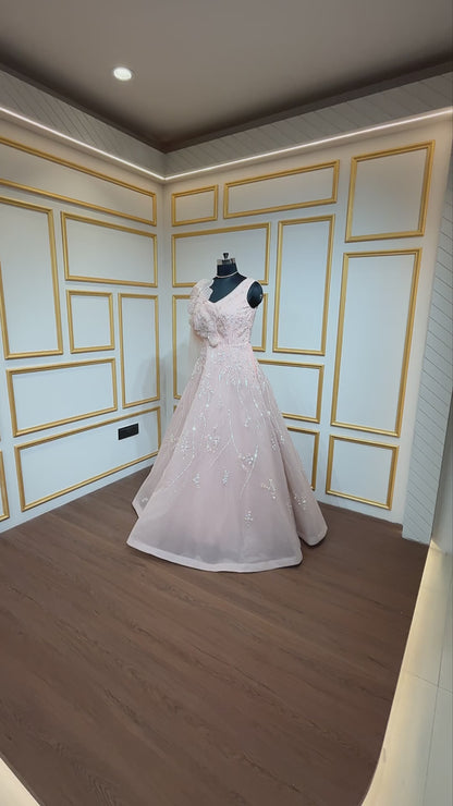 Crystal & pearl work on mesh gown in powder peach color