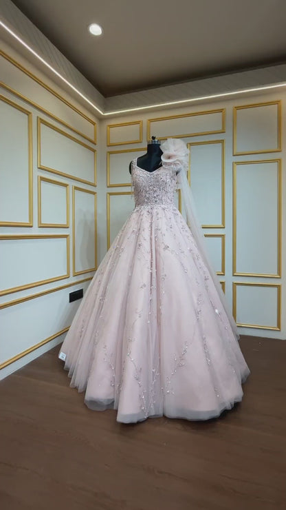Pearl & crystal work on Light peach ball gown in net
