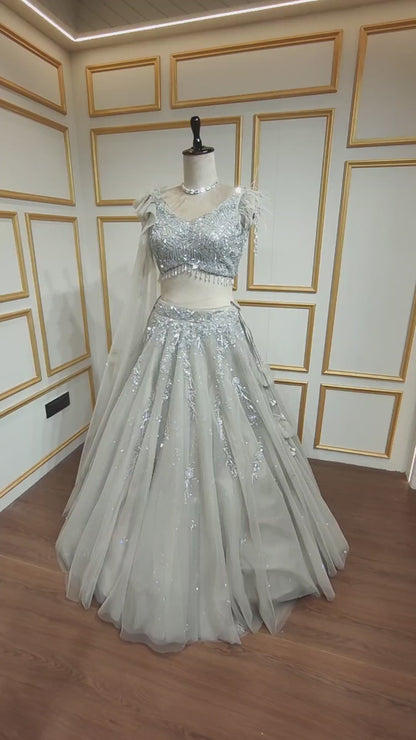 Powder grey lehenga in net with sequins & zarkan