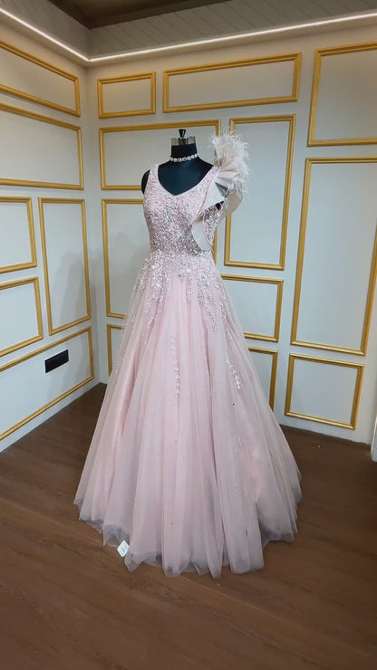 Peach engagement gown with pearl & crystal in net