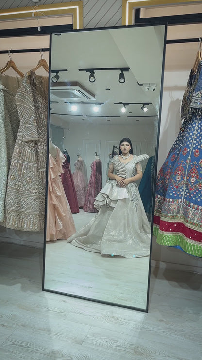 Pale gold imported wrinkled fabric engagement gown with zari & pearl work
