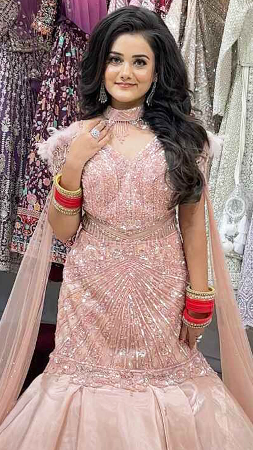 Ruffle mermaid gown in peach with pearl & sequins handwork and cape with falling sleeves