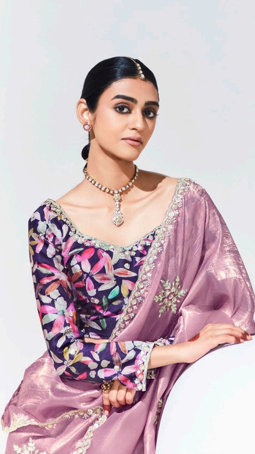 Zari & crystal work on mauve pink glaze organza saree with dark purple printed blouse
