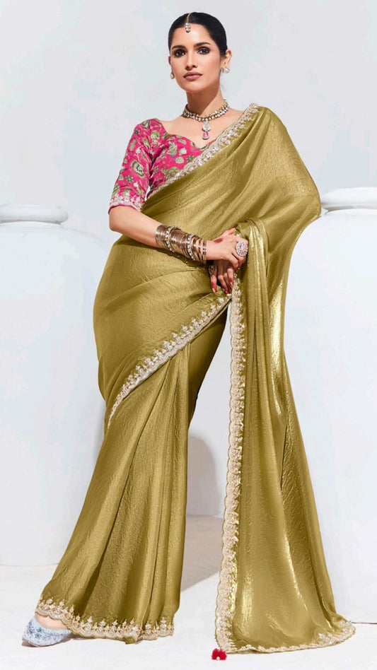 Golden organza saree with deep pink printed unstitched blouse