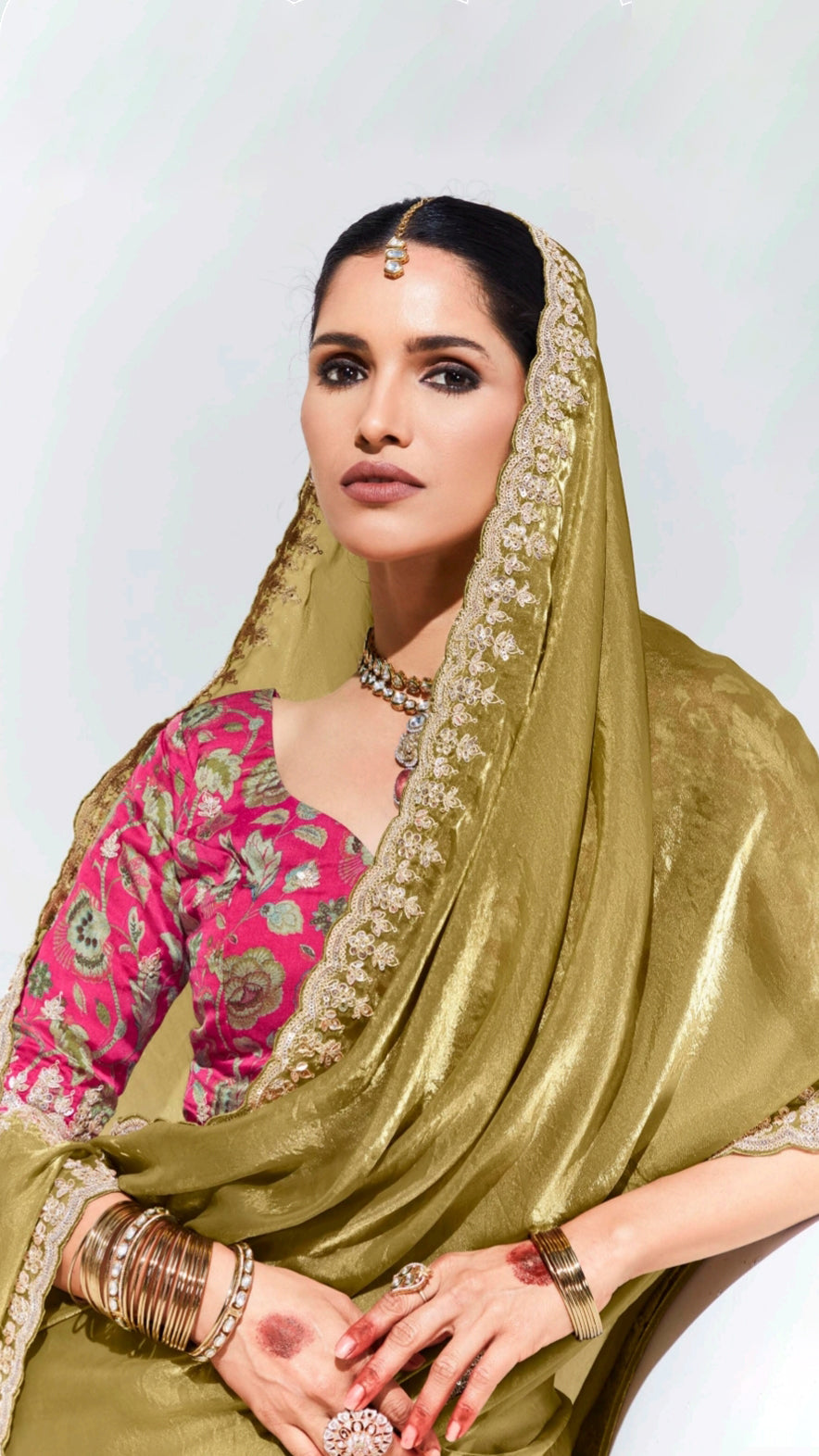 Golden organza saree with deep pink printed unstitched blouse