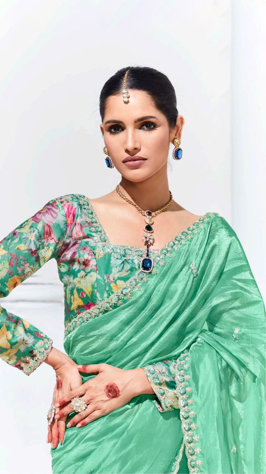 Mint green saree with printed blouse and gota patti work in glaze organza