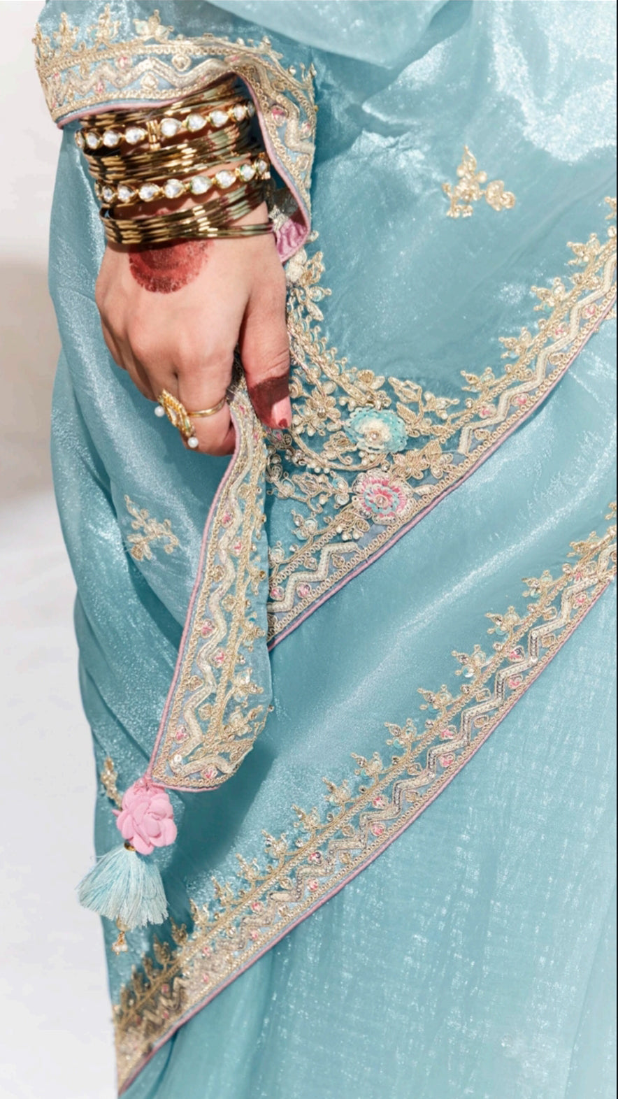 Baby blue organza saree with contrasting printed light pink unstitched blouse