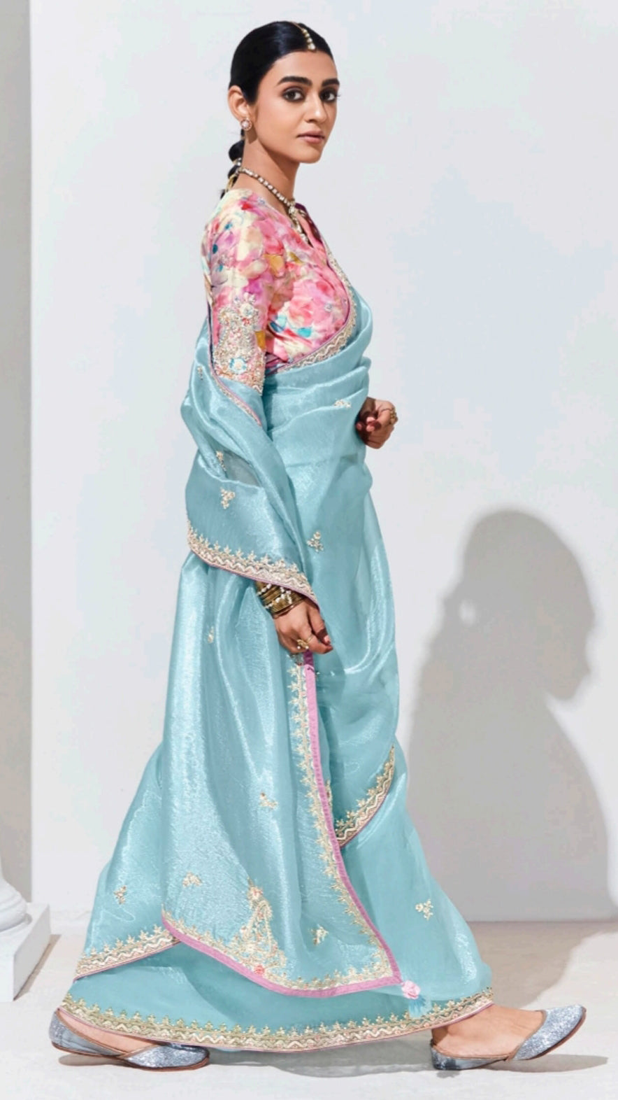 Baby blue organza saree with contrasting printed light pink unstitched blouse