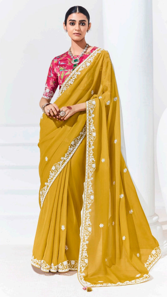 Georgette saree in mustard with thread work  and magenta printed blouse