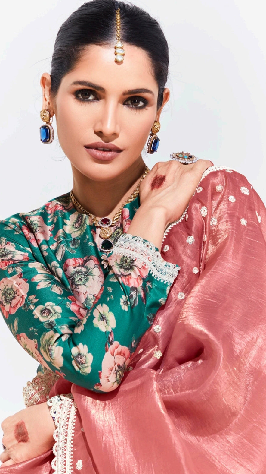 Coral saree in glaze organza with dark teal printed unstitched blouse