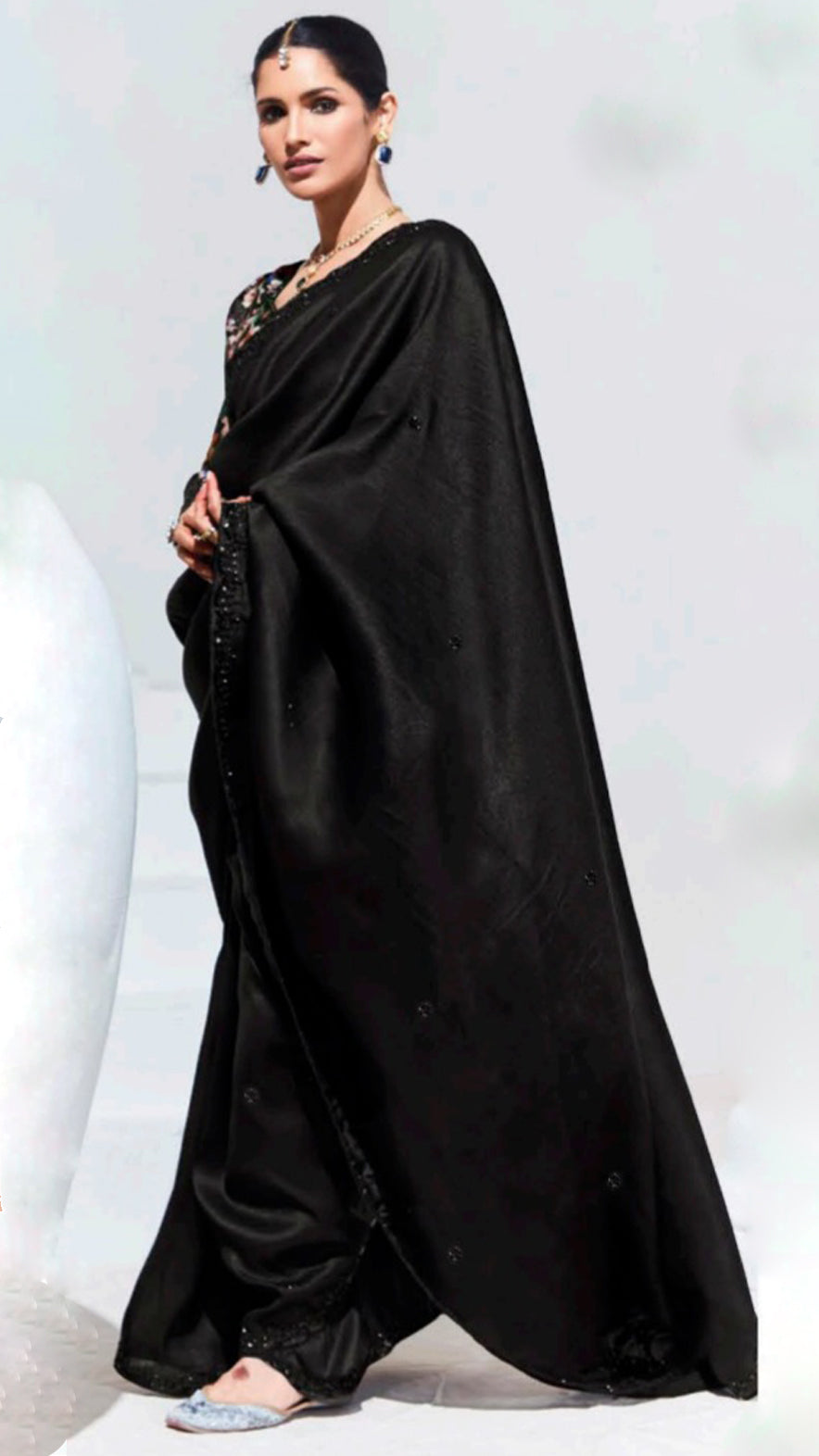 Organza saree in black with sequins border and multicolour unstitched blouse