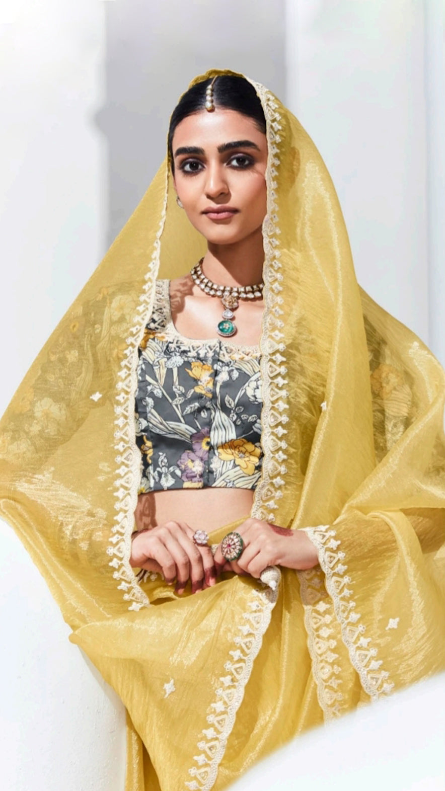 Organza saree with thread work border in pastel yellow and grey printed blouse