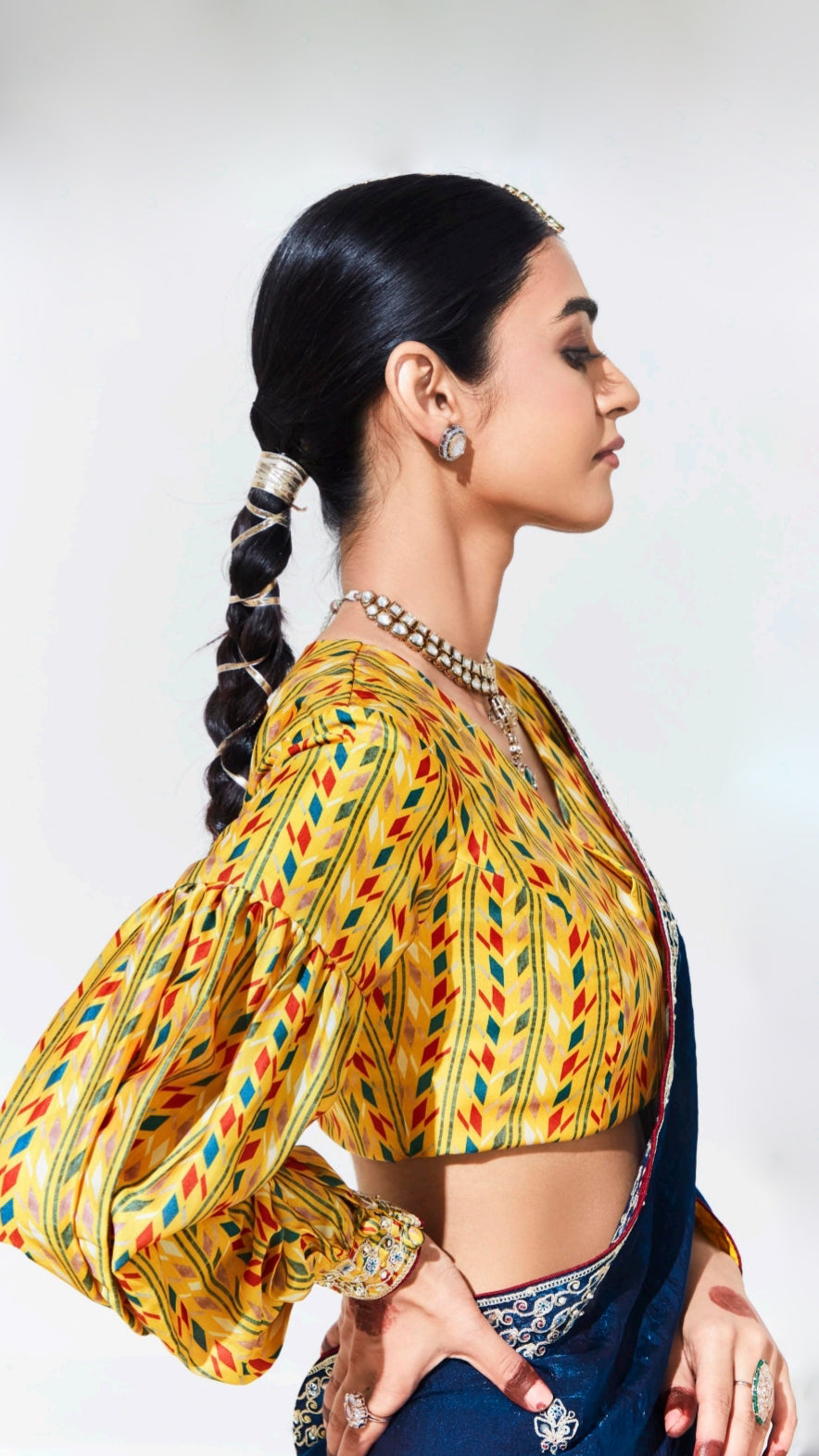 Sapphire blue saree with contrasting printed yellow unstitched blouse in glaze organza