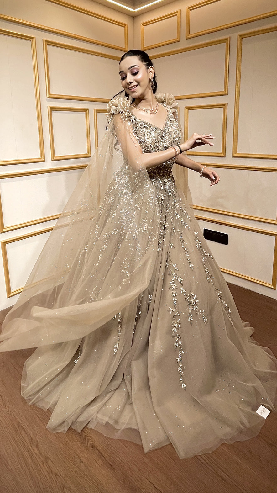 Tan color sequins & pearl work engagement gown in net